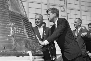 Astronaut John Glenn and President John F. Kennedy inspect the Friendship 7, the Mercury capsule which Glenn rode in orbit. Kennedy presented Distinguished Service medal to Glenn at Cape Canaveral, Fla., Feb. 23, 1962.  In background right is Vice President Lyndon Johnson. (AP Photo/Vincent P. Connolly)